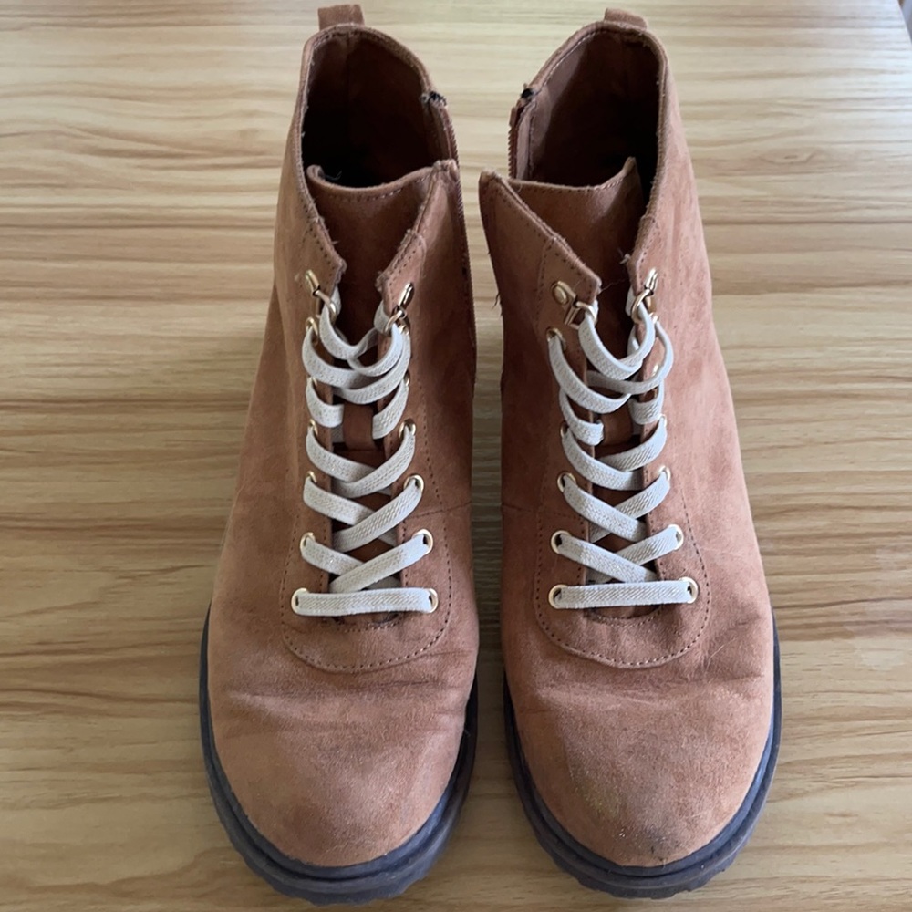 Combat boots say size 4 but actually fit size 7